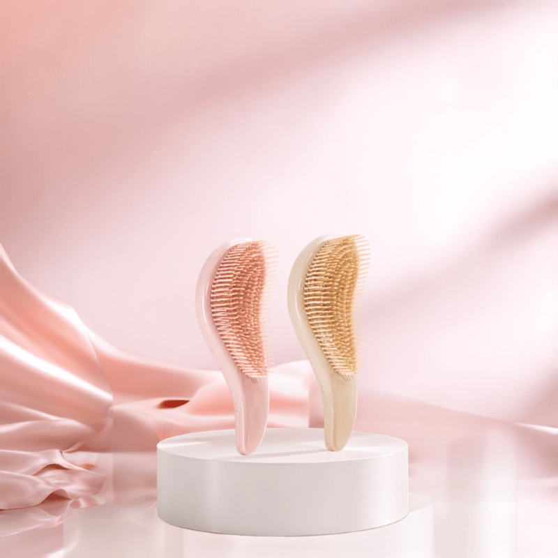 Two EcoGlide detangling brushes